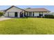 Charming one-story home with well-maintained lawn and inviting curb appeal at 1231 Pine Needle Rd, Venice, FL 34285