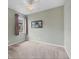 Simple bedroom with carpet flooring, a window, and calming green paint at 1241 Creek Nine Dr, North Port, FL 34291