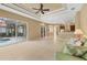 Open living room overlooking the lanai at 1241 Creek Nine Dr, North Port, FL 34291
