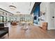Spacious clubhouse interior with modern decor, ample seating, and large windows offering scenic views at 12418 Asana Ct, Venice, FL 34293