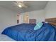 Cozy bedroom with a comfortable bed, plush bedding, and access to an en-suite bathroom, providing a relaxing retreat at 13150 Huerta St, Venice, FL 34293