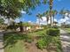 Charming one-story home with mature landscaping and a well manicured lawn at 13150 Huerta St, Venice, FL 34293