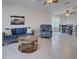Comfortable living room with stylish furnishings and neutral decor, perfect for relaxing and entertaining guests at 13150 Huerta St, Venice, FL 34293