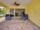 Inviting outdoor patio featuring stylish furniture and a seamless transition to the interior living space at 13150 Huerta St, Venice, FL 34293