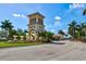 Grand entrance tower with manicured landscaping welcoming residents and visitors to the Wellen Park community at 13511 Esposito St, Venice, FL 34293