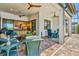 Expansive outdoor living area with multiple seating options and seamless connection to indoor spaces at 13511 Esposito St, Venice, FL 34293