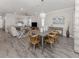 Open-concept living and dining area offers ample space for relaxation and entertaining at 149 Vinadio Blvd, Nokomis, FL 34275