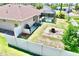 A fenced backyard featuring a screened pool, patio area, and space for outdoor entertainment at 1510 Haffenberg Ave, North Port, FL 34288