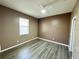 Cozy bedroom features a window for natural light and neutral wall color at 1510 Haffenberg Ave, North Port, FL 34288