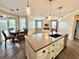 Open kitchen flows into the dining area and living room, and features a spacious island at 1510 Haffenberg Ave, North Port, FL 34288
