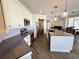 Spacious kitchen with large island, stainless appliances, and convenient access to dining area at 1510 Haffenberg Ave, North Port, FL 34288