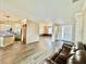Open-concept living room with views of the kitchen, dining area, and front door at 1510 Haffenberg Ave, North Port, FL 34288