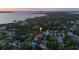 Aerial view showing the neighborhood and proximity to the coast at 1629 Siesta Dr, Sarasota, FL 34239