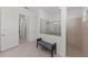 Modern bathroom with glass-enclosed shower and neutral tile work at 17324 Sandpearl Rd, Venice, FL 34293