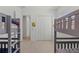 Bedroom featuring bunkbeds and white closet doors, offering a spacious and functional area at 17324 Sandpearl Rd, Venice, FL 34293