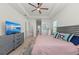 Spacious bedroom with a king bed, a ceiling fan, and recessed lighting at 17324 Sandpearl Rd, Venice, FL 34293