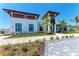 Elegant clubhouse with a modern design and lush landscaping at 17324 Sandpearl Rd, Venice, FL 34293