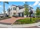 Elegant commercial building with outdoor dining area, featuring a corner location at 17324 Sandpearl Rd, Venice, FL 34293