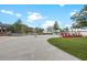 Inviting common area featuring lush landscaping, seating, and picturesque views, enhancing the neighborhood's appeal at 17324 Sandpearl Rd, Venice, FL 34293