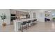 Stylish kitchen featuring a large center island, modern appliances, and sleek countertops at 17324 Sandpearl Rd, Venice, FL 34293