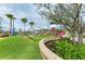 Community playground featuring modern play equipment at 17324 Sandpearl Rd, Venice, FL 34293