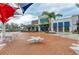 Exterior shot of restaurant with outdoor seating, set in a walkable, modern community at 17324 Sandpearl Rd, Venice, FL 34293