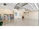 Spacious three car garage with lots of room for storage and parking at 20126 Elegante Ct, Venice, FL 34293