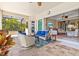 Relaxing covered patio leading into the home at 20126 Elegante Ct, Venice, FL 34293