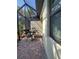 Charming brick-paved patio with a table and chairs, offering a cozy outdoor dining experience at 20188 Tesoro Dr, Venice, FL 34293