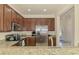 Modern kitchen featuring stainless steel appliances and granite countertops at 20237 Lagente Cir, Venice, FL 34293