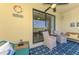 Cozy patio with comfortable seating, stylish outdoor rug and view of lake at 20237 Lagente Cir, Venice, FL 34293