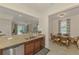 Open-concept view from the kitchen into the dining area and living room for easy communication at 20290 Lagente Cir, Venice, FL 34293