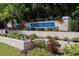 A manicured flower bed welcomes you to the Myrtle Trace community at 229 Southampton Drive # 290, Venice, FL 34293