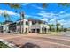 Modern building featuring sleek architecture, large windows, and outdoor awnings at 23494 Copperleaf Dr, Venice, FL 34293