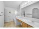 Primary bath features dual sinks and walk-in closet at 24477 Lakeside Mnr, Punta Gorda, FL 33980