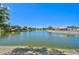 Scenic water view highlighting the surrounding neighborhood properties at 24477 Lakeside Mnr, Punta Gorda, FL 33980