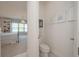 Hallway view to the bedroom showcasing the ensuite bathroom at 264 Caserta Ct, Nokomis, FL 34275