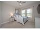 Bedroom with two windows, a ceiling fan, and soft natural light at 264 Caserta Ct, Nokomis, FL 34275