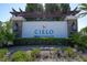 An attractive community sign made of stone and block with lush landscaping at 264 Caserta Ct, Nokomis, FL 34275