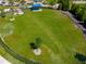 Expansive green space perfect for outdoor activities and leisure with fenced yard and mature landscaping at 264 Caserta Ct, Nokomis, FL 34275