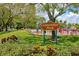 Centennial Park sign with shade trees and people enjoying the splash pad at 264 Caserta Ct, Nokomis, FL 34275