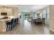 Open-concept living room with lots of natural light, seamlessly flowing into the kitchen at 268 Ibiza Loop, Venice, FL 34292