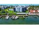 Waterfront condo building with boat docks offering convenient access to the water at 2955 N Beach Rd # A422, Englewood, FL 34223