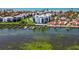 Waterfront condos feature boat docks, lush landscaping, and pool with ocean views at 2955 N Beach Rd # A422, Englewood, FL 34223