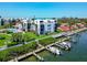 Beautiful waterfront condos feature boat docks, pool, and well-manicured lawns near the open ocean at 2955 N Beach Rd # A422, Englewood, FL 34223