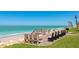 Scenic beachfront with benches and wooden walkway, offering stunning ocean views for residents at 2955 N Beach Rd # A422, Englewood, FL 34223