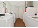 Community Laundry Room with multiple coin operated commercial washers and dryers for resident use at 2955 N Beach Rd # A422, Englewood, FL 34223