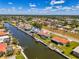 Waterfront community with multiple docks and boat access, aerial view at 322 Oakwood Cir, Englewood, FL 34223