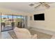 Inviting living room with tile floors, view to the lanai, and comfortable seating at 322 Oakwood Cir, Englewood, FL 34223