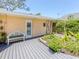 Secluded backyard area with decking, landscaping, and an outdoor seating area at 337 Harbor S Dr, Venice, FL 34285